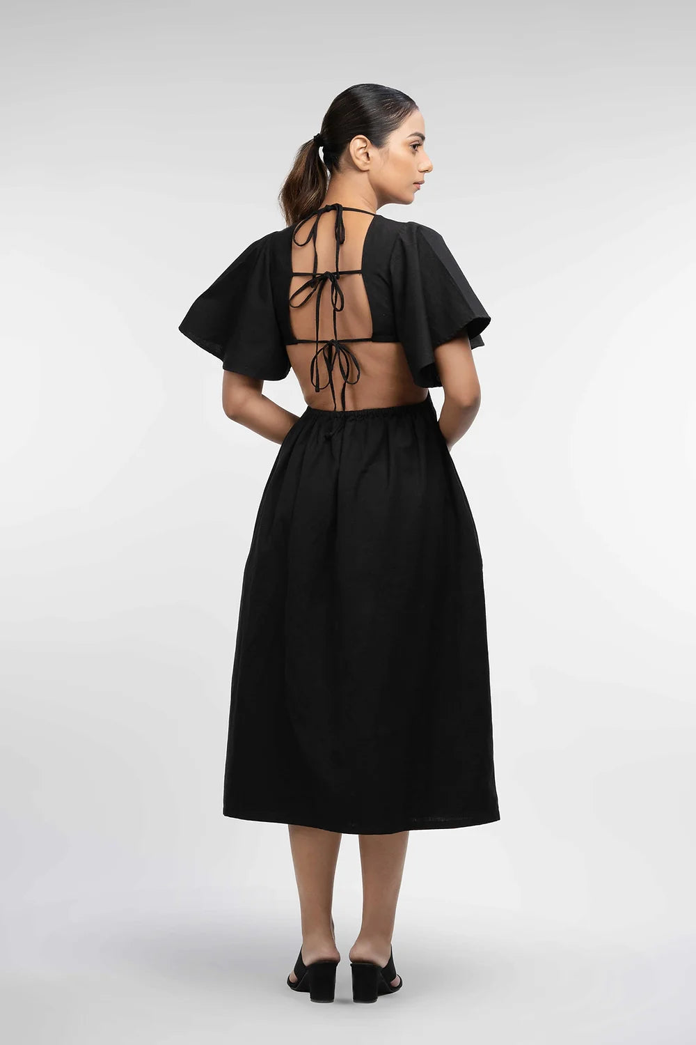 Navya open back dress